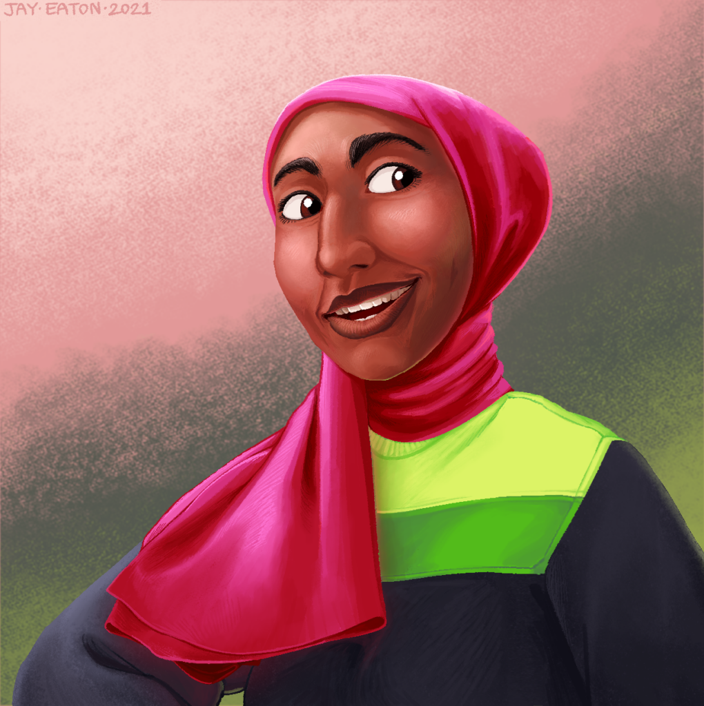 Portrait of Idrisah. She is a long-faced woman with medium brown skin, brown eyes, and arching black eyebrows. She is wearing a black and green color block sweater and a pink satin hijab. She has a bemused smile.